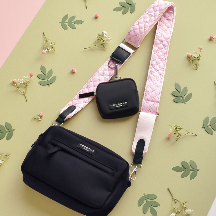 Quilted pink floral Cocopup London dog walking bag bundle on a green and pink floral background.