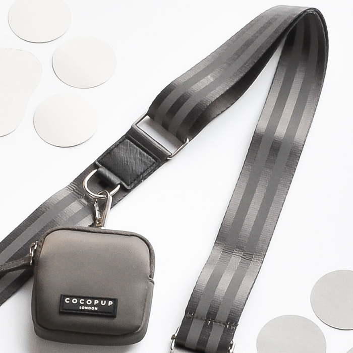 Cocopup London reflective mocha dog walking bag with attached small grey poop bag pouch.