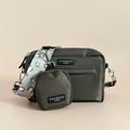Sage green dog walking bag with leopard print, matching pouch, and strap, displayed on a neutral background.