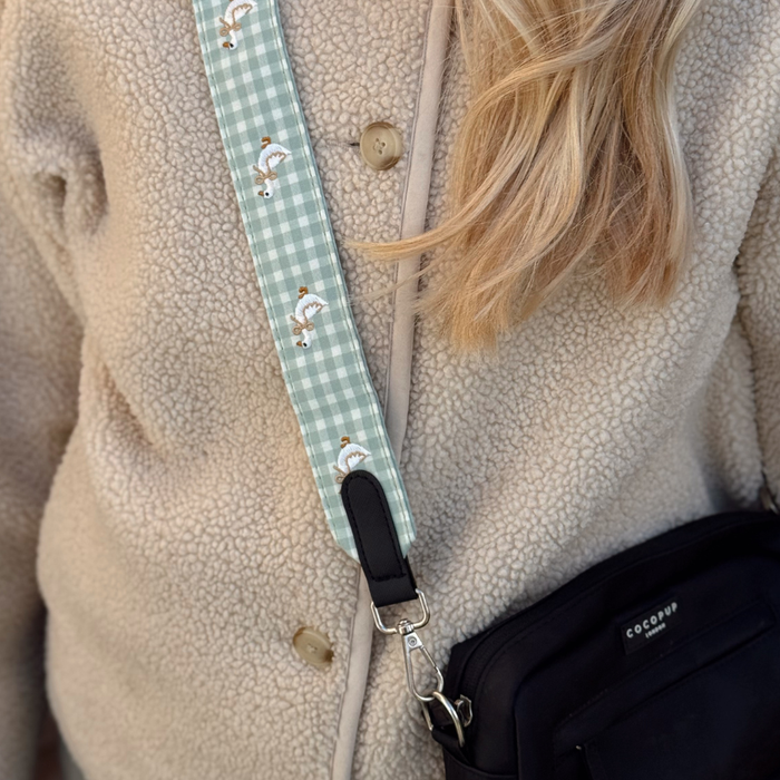 Beige fleece worn with Cocopup London Silly Goose Dog Walking Bag Bundle featuring an embroidered duck strap.