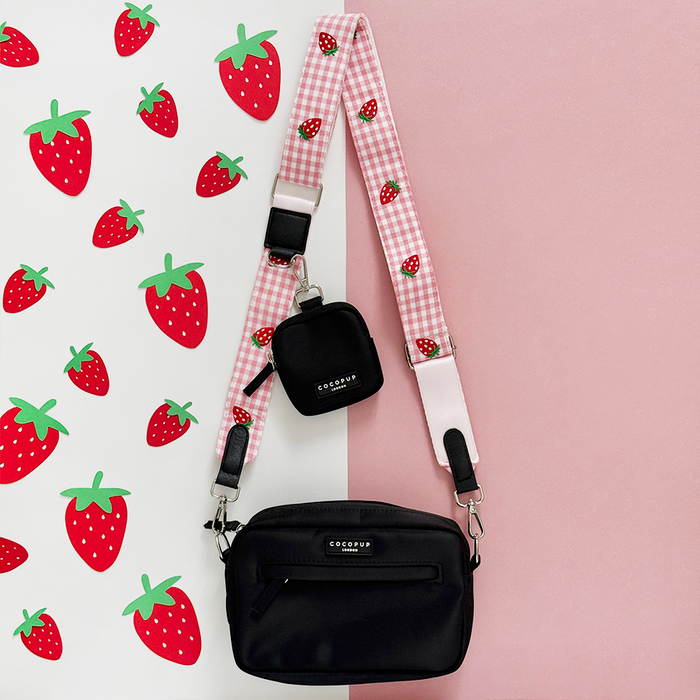 Strawberry-patterned Cocopup London dog walking bag bundle with pink accents and adjustable strap.
