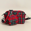 Tartan Cocopup London dog walking bag and matching treat pouch on a plain beige background.