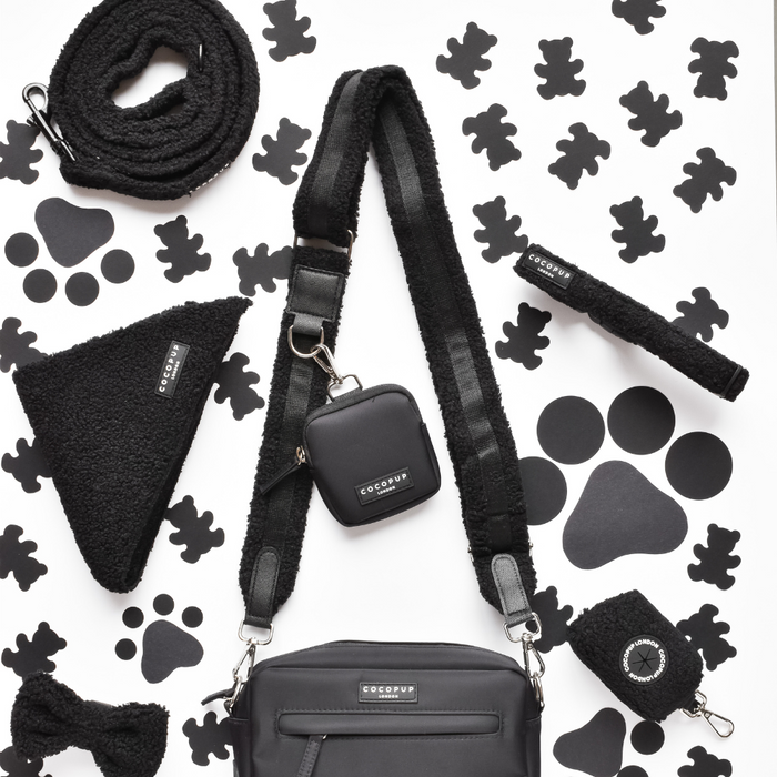 Cocopup London Teddy Baloo dog walking bag bundle on a white background with paw and bone prints.