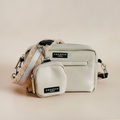 Tan Teddy Rupert dog walking bag and matching treat pouch by Cocopup London on a plain background.