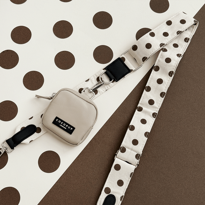 Polka dot strap on a brown and white polka dot background
