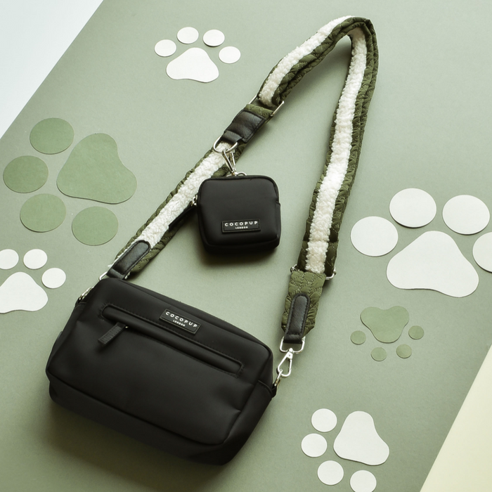 Khaki quilted Cocopup London dog walking set with treat pouch on green surface with white paw prints.