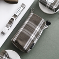 Olive check drawstring treat pouch with clip, in a stylish fabric design by Cocopup London.