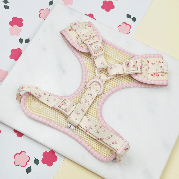 Floral Dog Harness with yellow background and pink flowers.