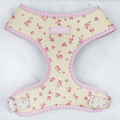 Floral Dog Harness with yellow background and pink flowers.