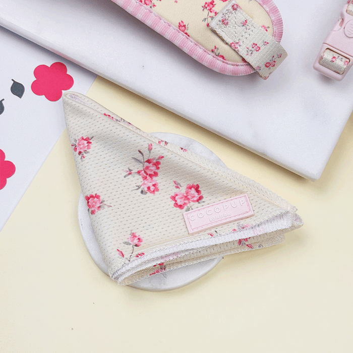 Floral Dog Bandana with yellow background and pink flowers.