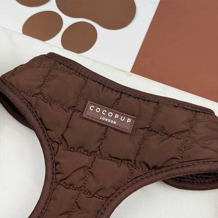 Espresso brown quilted adjustable neck harness by Cocopup London on a white and brown background.