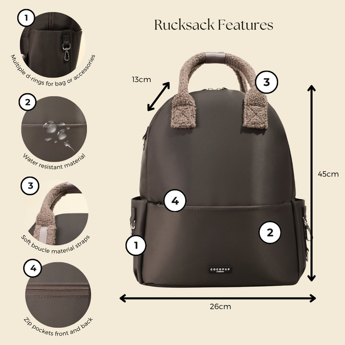 Mocha brown rucksack with boucle handles and zippered pockets, made from water-resistant material.