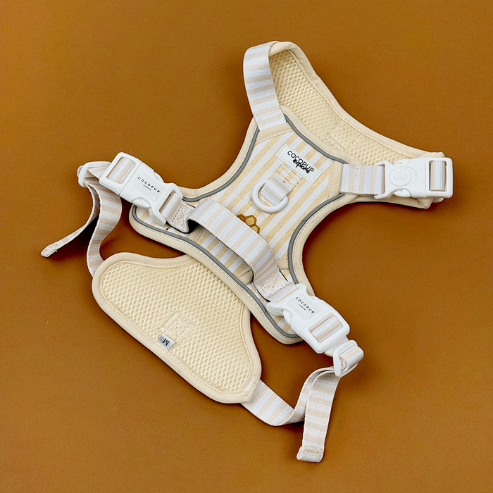 Pale yellow and white striped Dog Harness with embroidered honeycomb and bees, featuring Cocopup Explore logo.