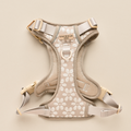 Mocha brown pet harness with white flower pattern by Cocopup London on a neutral background.
