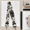 Ivory tortoiseshell Cocopup London bum bag strap with metal clips next to two beige bags on a neutral background.