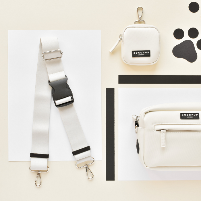 Cocopup London dog walking bag with matching bum bag strap in oyster white, shown flat against a neutral background.