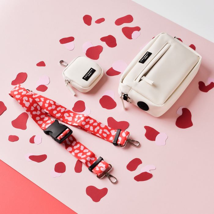 Cocopup London bum bag strap in red and pink leopard print with adjustable clasp and sturdy fabric.