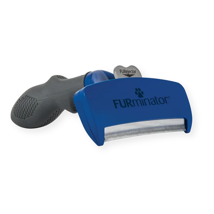 FURminator large long hair deShedding tool showing the FURejector button on the handle
