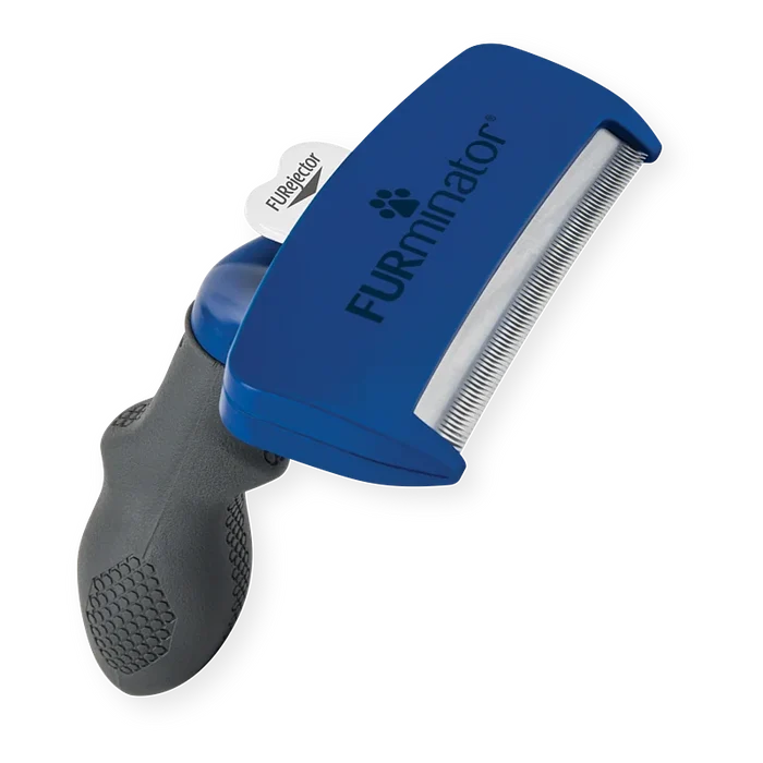 FURminator large short hair undercoat deShedding tool, angled view of handle and FURejector button