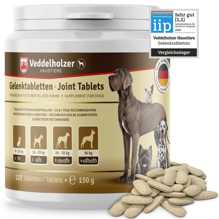 Braun-weiße Dose mit 125 Tabletten (150 g), iip-Siegel „Sehr gut (1,1)“ und Fütterungstabelle, davor ein Haufen beiger Tabletten