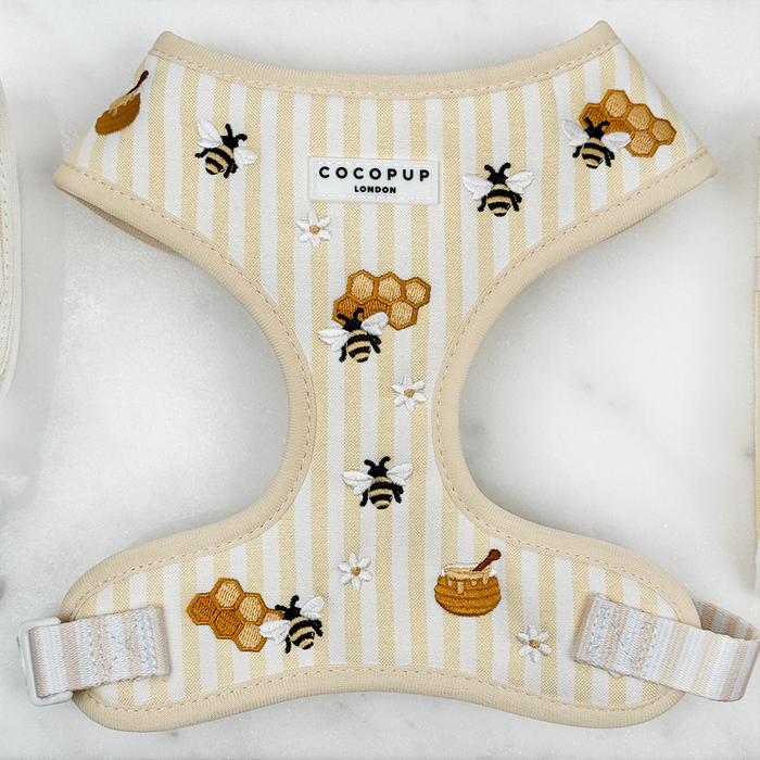 Pale yellow and white striped Dog Harness with bee and honeycomb embroidered decals.