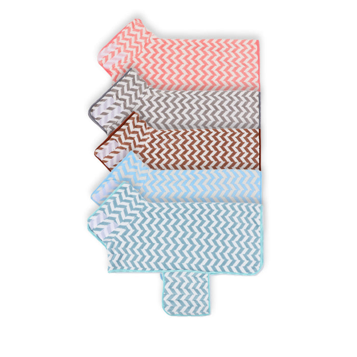 All five colourways of the pet drying wrap, stacked to show the zigzag weave
