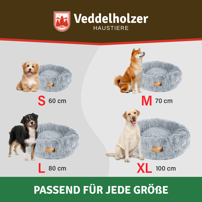 Vier hellgraue Betten mit Hunden daneben: S 60 cm, M 70 cm, L 80 cm und XL 100 cm Durchmesser