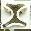 Khaki quilted dog harness with adjustable neck and white fleece lining, displayed on a white surface.