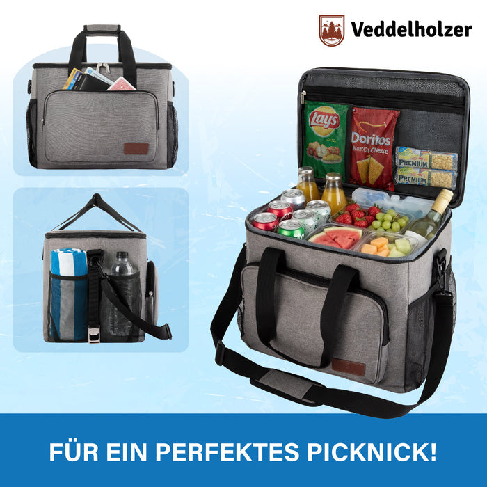 Tasche gefüllt mit Getränkedosen, Obst, Chips und Wein, dazu Fronttasche mit Besteck und Seitenfach mit Decke