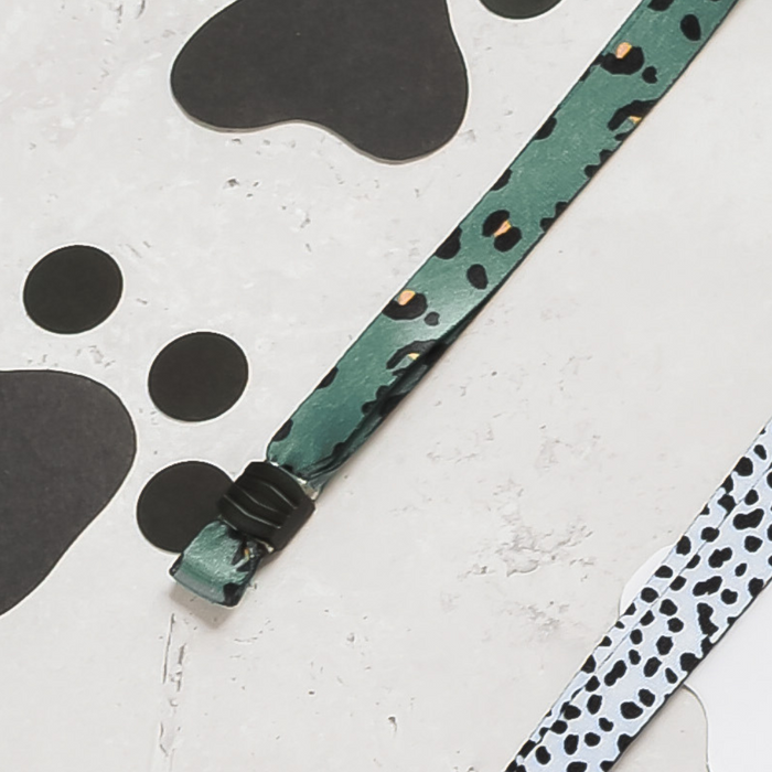 Khaki leopard print Cocopup London lanyard displayed on a white surface.