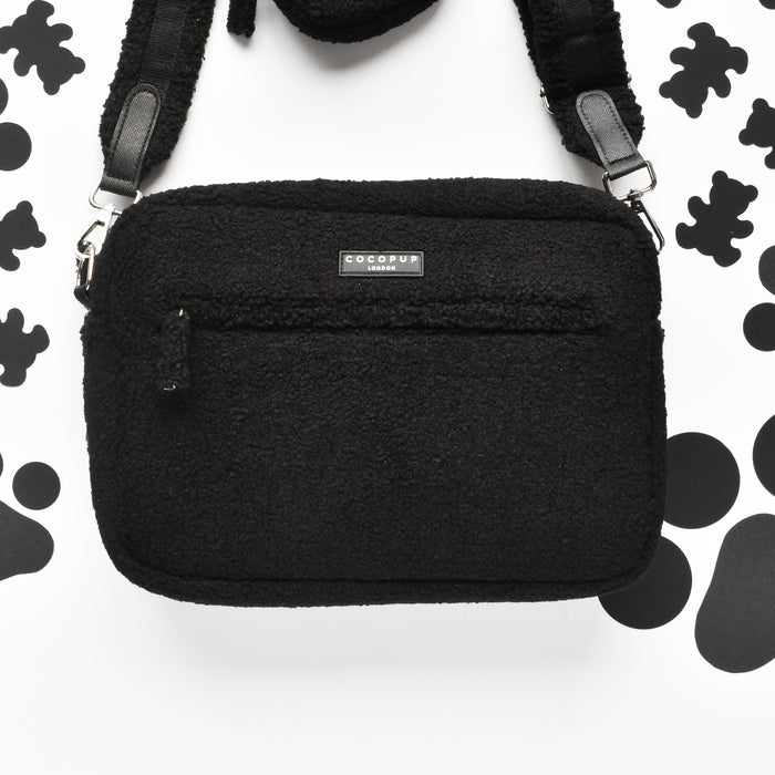 Large fuzzy brown Cocopup London dog walking bag with front zip pocket and built-in poop bag dispenser.