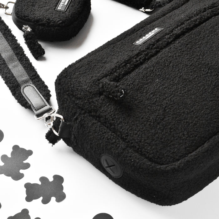 Cocopup London large black textured dog walking bag with pouch, gray strap, and white bear-shaped cutouts.