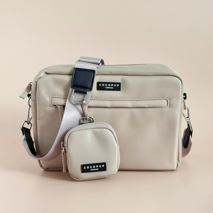 Caramel latte-colored dog walking bag and matching treat pouch by Cocopup London on a light background.