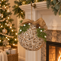 Large white rattan Christmas bauble with LED-lit branches and decorative ribbon.