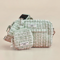 Matcha green textured tweed dog walking bag bundle with treat pouch, displayed on a beige background.