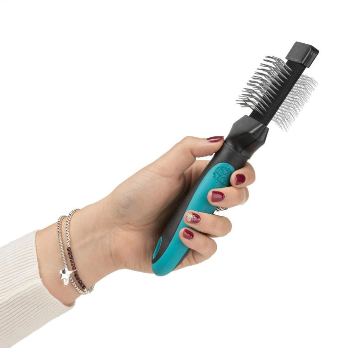 Hand holding the Mikki Classic Pro Slicker showing both pin sides