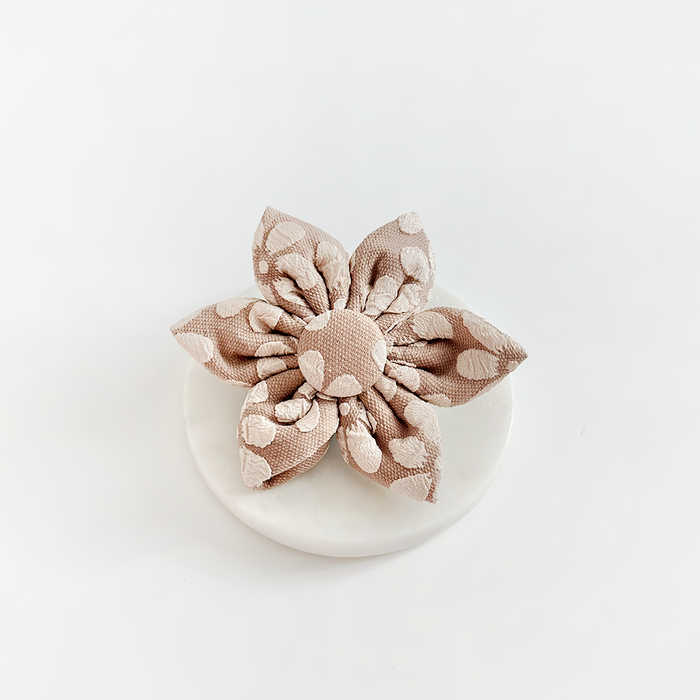 LUXE Mocha Flower dog collar accessory by Cocopup London, brown floral design on a white round surface with white background.