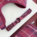 Mulberry plaid dog collar with a safety lock buckle, shown on a matching patterned background.