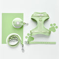 Cocopup Londons NAKD Matcha set in soft green, includes harness, lead, collar and poop bag holder on white and green background.