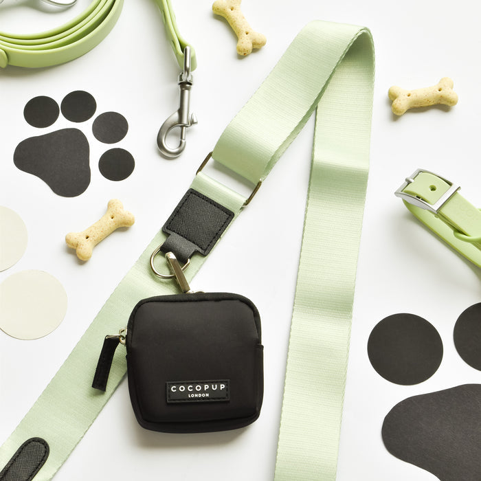 A green leash and dog leash featuring a sage-coloured strap, perfect for coordinating with the Cocopup London NAKD Bag Strap - Matcha from the NAKD collection.
