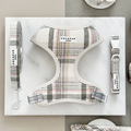 Cocopup London plaid dog harness, lead, and collar set in blue and white Oxford pattern on a marble surface.