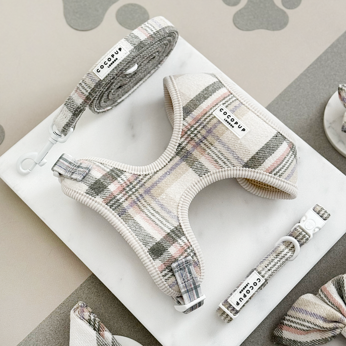 Oxford Plaid dog lead from Cocopup London with a checkered pattern, shown on a white marble surface.
