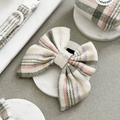 Plaid sailor bow tie in pink, green, and purple from Cocopup London.