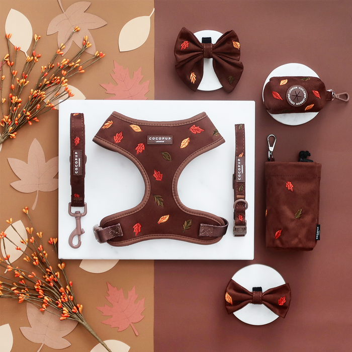Cocopup London harness set with leaf pattern; includes adjustable harness, matching lead, collar, bow tie, and poop bag holder.