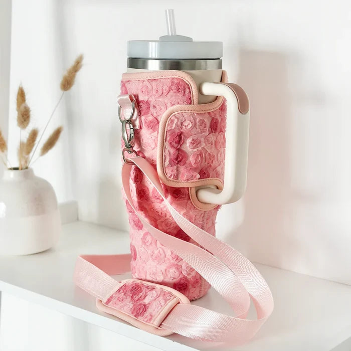 Pink floral tumbler carry case with strap and card pocket from Cocopup London.