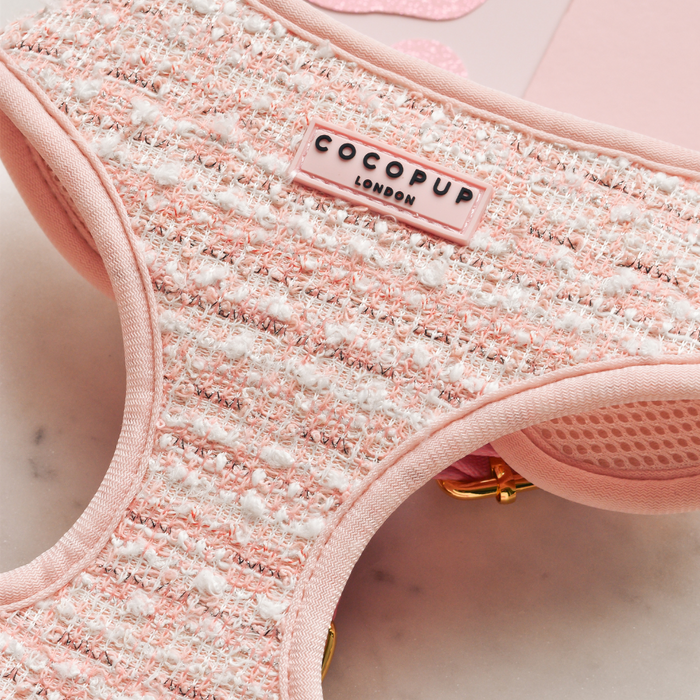 Pink textured tweed adjustable harness, lead, and collar set from Cocopup London on a light background.