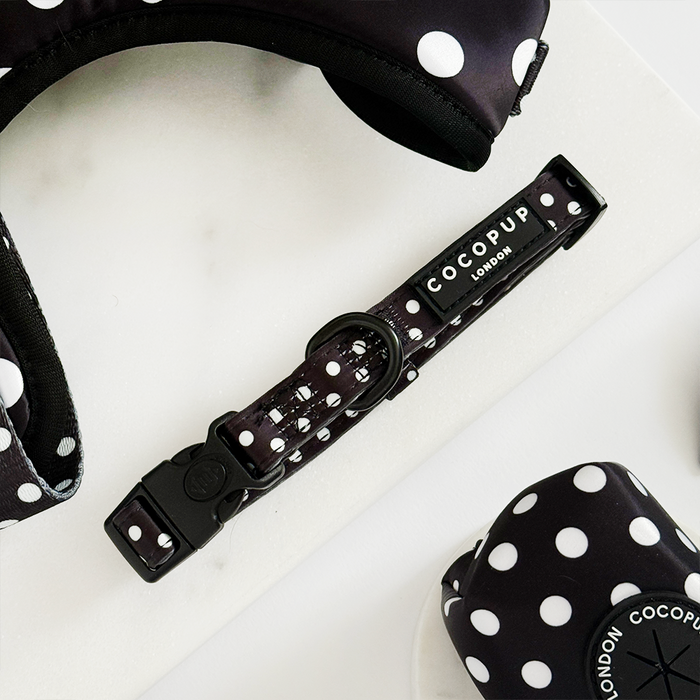 Cocopup London harness, lead, and collar set with black polka dots on white, displayed against a plain background.
