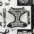 Cocopup London Pup in Paris bundle with checkered harness, collar, and lead featuring white fabric and bow print.