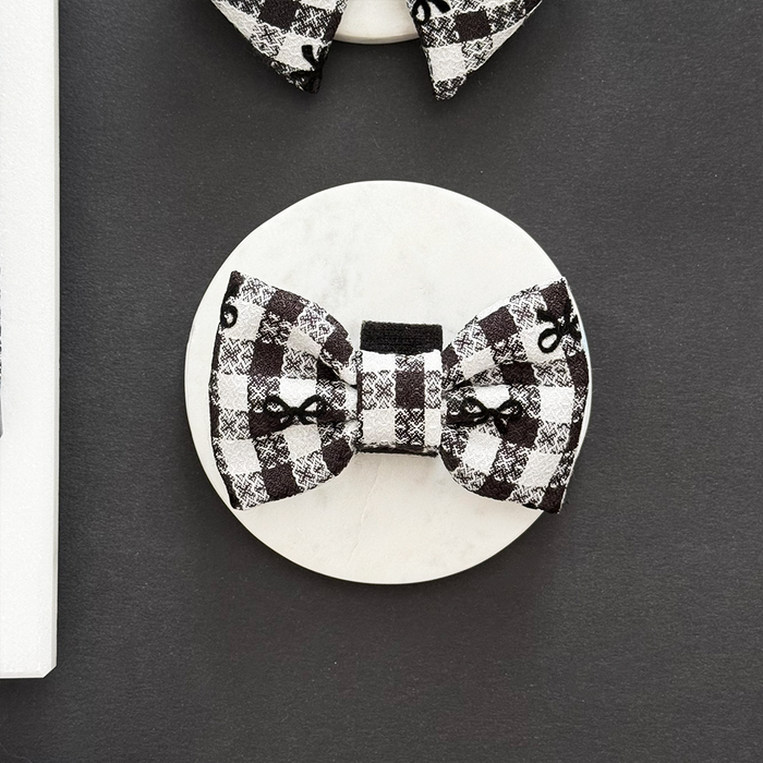 Cocopup London Pup in Paris Bow Tie with black and white checkered pattern and musical note accents.