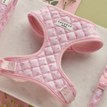 Pink quilted harness, lead, and collar set with small ditsy floral print.
